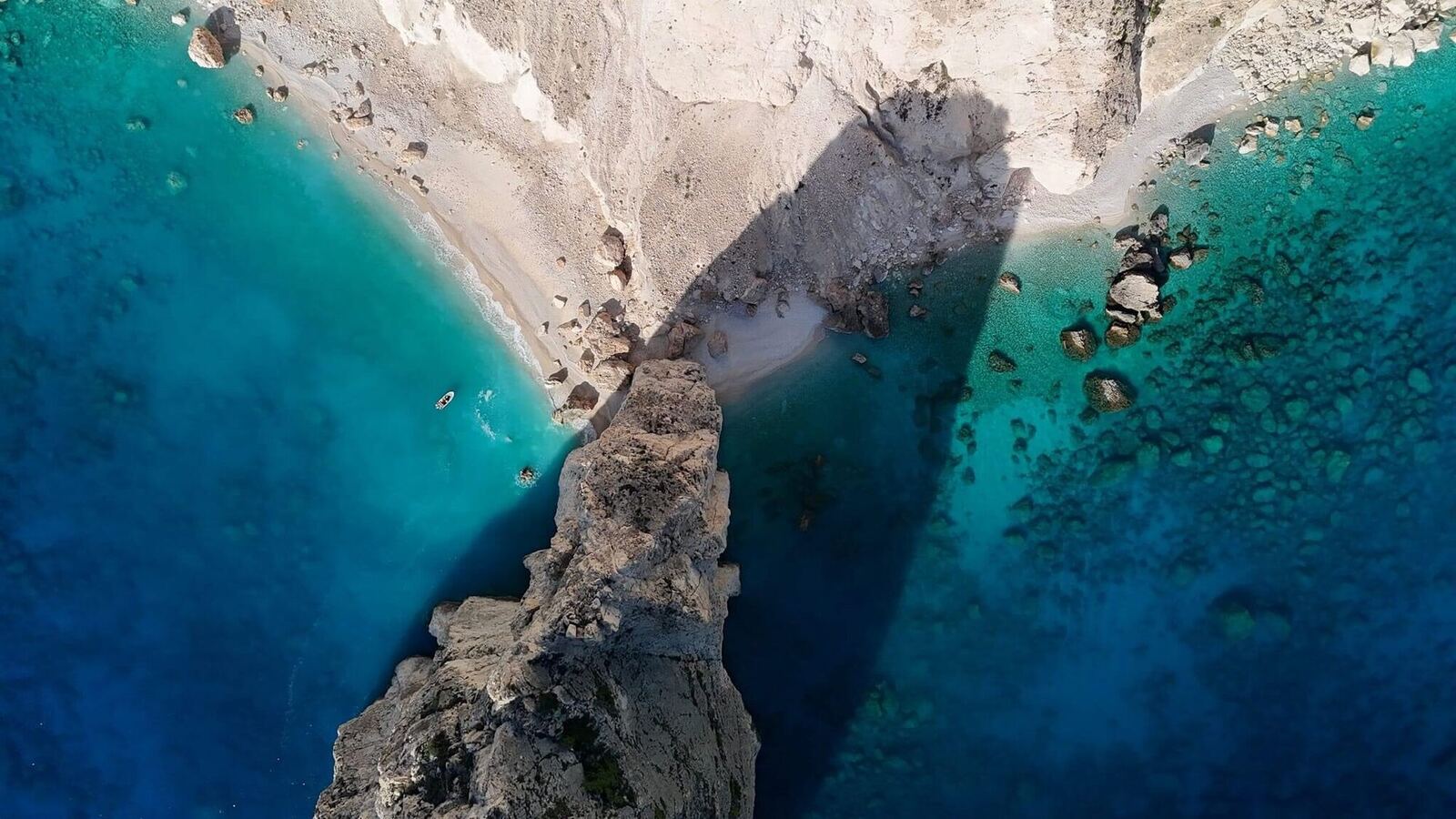 Aerial drone view of Myzithres rocks and sandy beach from above