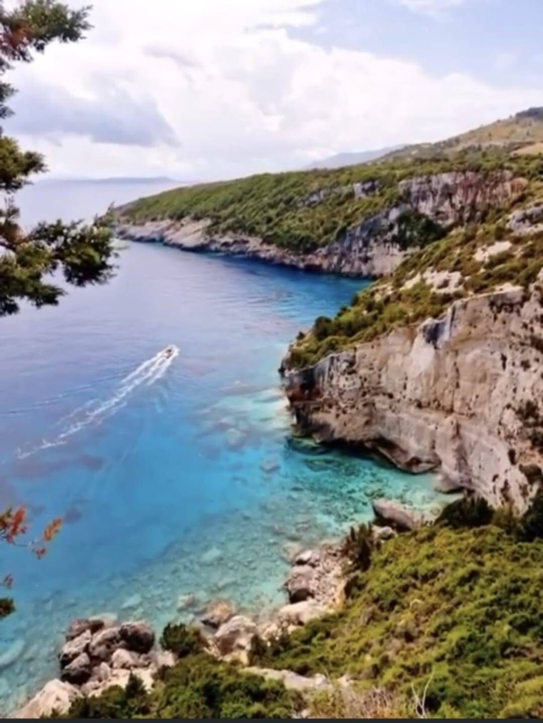 Crystal-clear shallows and deep blue water at Potamitis Diving Spot